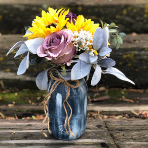 Navy mason jar wedding centerpieces with sunflowers