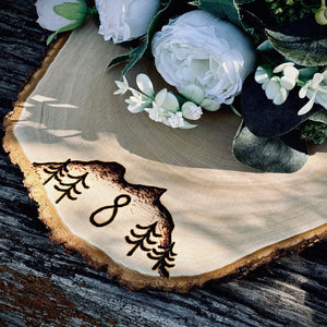 Engraved wood slice for wedding centerpiece with table number