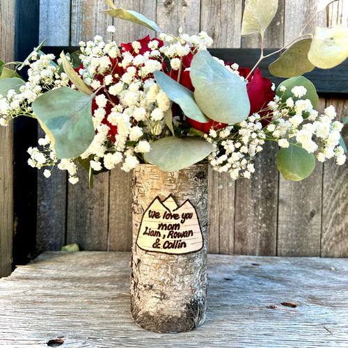 Mountain customized vase with red rose and babies breath floral arrangement