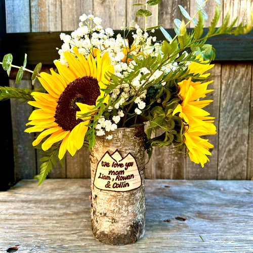 Mountain customized vase with sunflower and babies breath floral arrangement