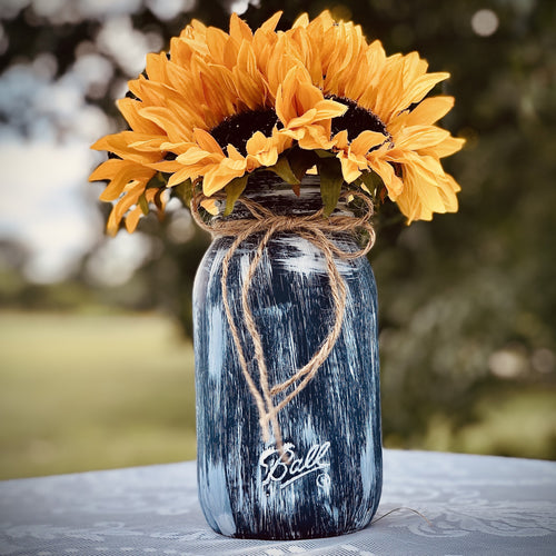 Navy mason jar wedding centerpieces with sunflowers