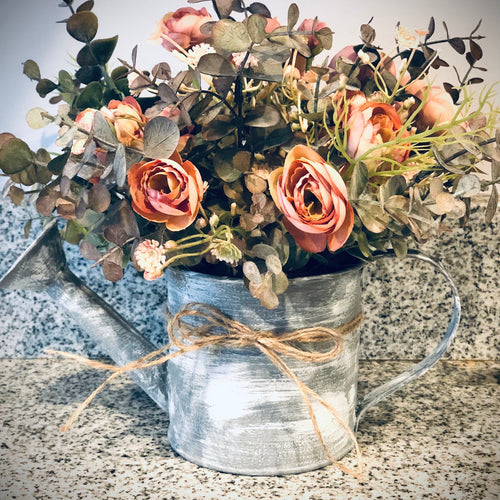Fall eucalyptus and ranunculus floral arrangement in watering can, Farmhouse watering can centerpiece kitchen decor, Window sill decor