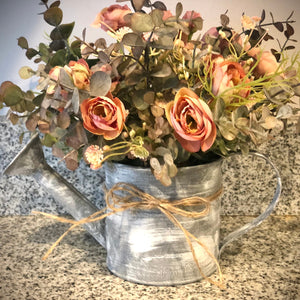 Fall eucalyptus and ranunculus floral arrangement in watering can, Farmhouse watering can centerpiece kitchen decor, Window sill decor