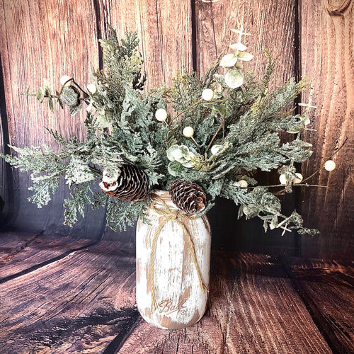 Rustic white mason jar with sparkling cedar and frosted eucalyptus | Winter wedding centerpieces for tables | Christmas wedding table decor